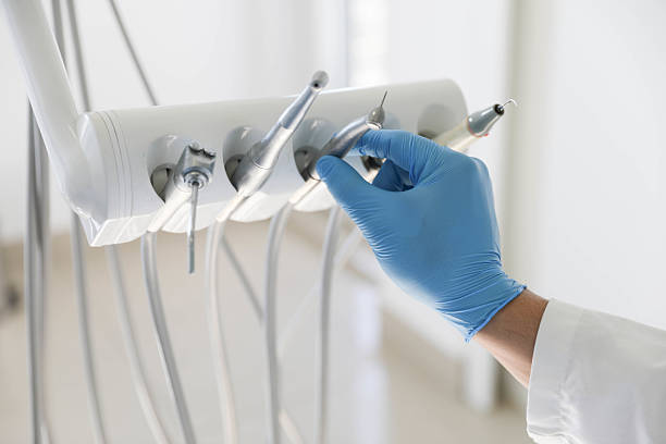 Professional Tooth Extraction technician working in Nuevo, CA